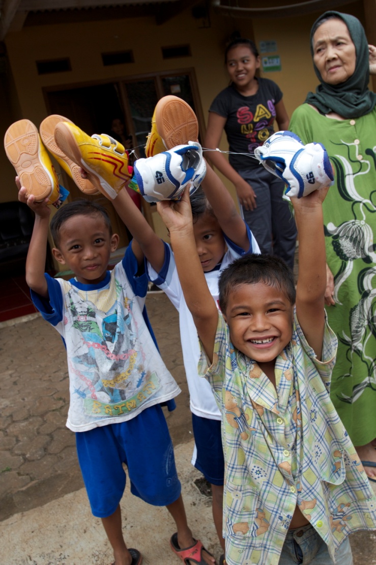 Happy to get donation of shoes